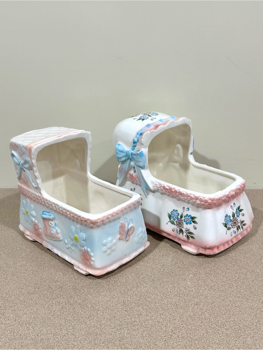 Two vintage ceramic baby crib planters